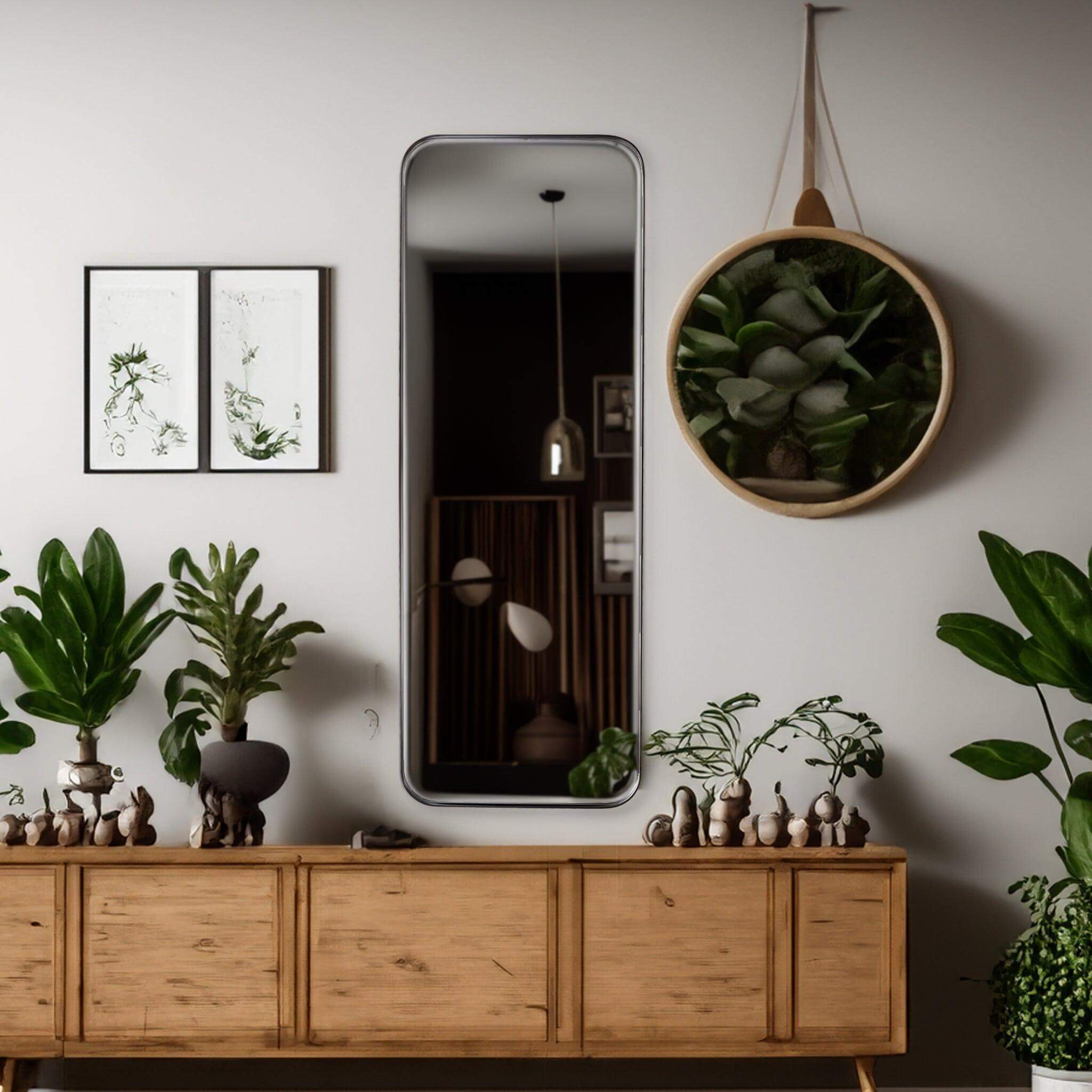 Large Cosmic Mirror in a modern living room with plants, showcasing industrial chic design and contemporary elegance.