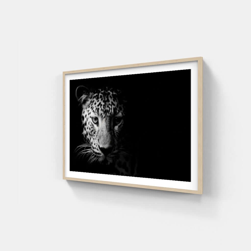 Framed print of a majestic leopard in black and white, ideal for wildlife and cultural art decor.