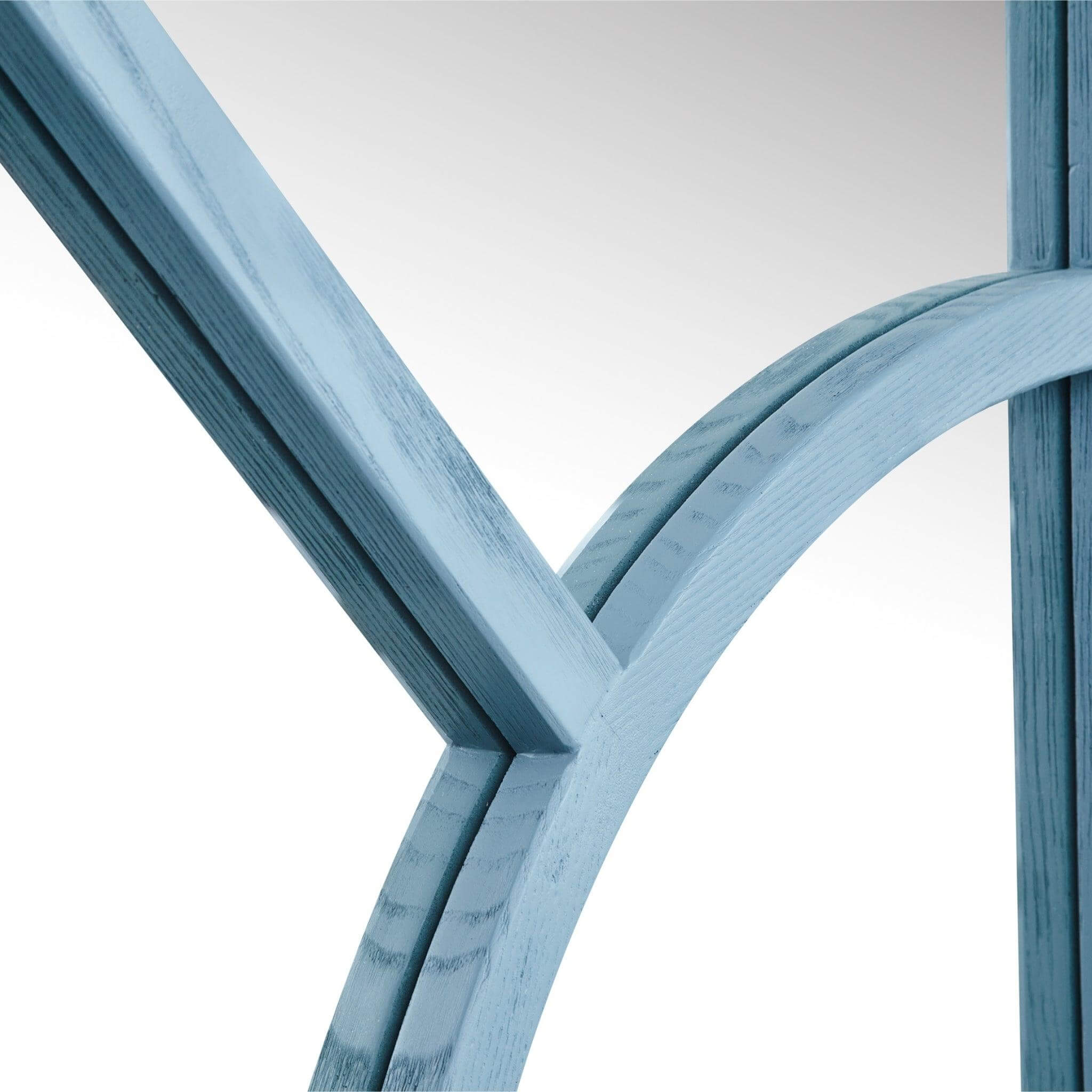 Close-up of the blue wood-styled frame of the large Arch Mirror with elegant arched design.
