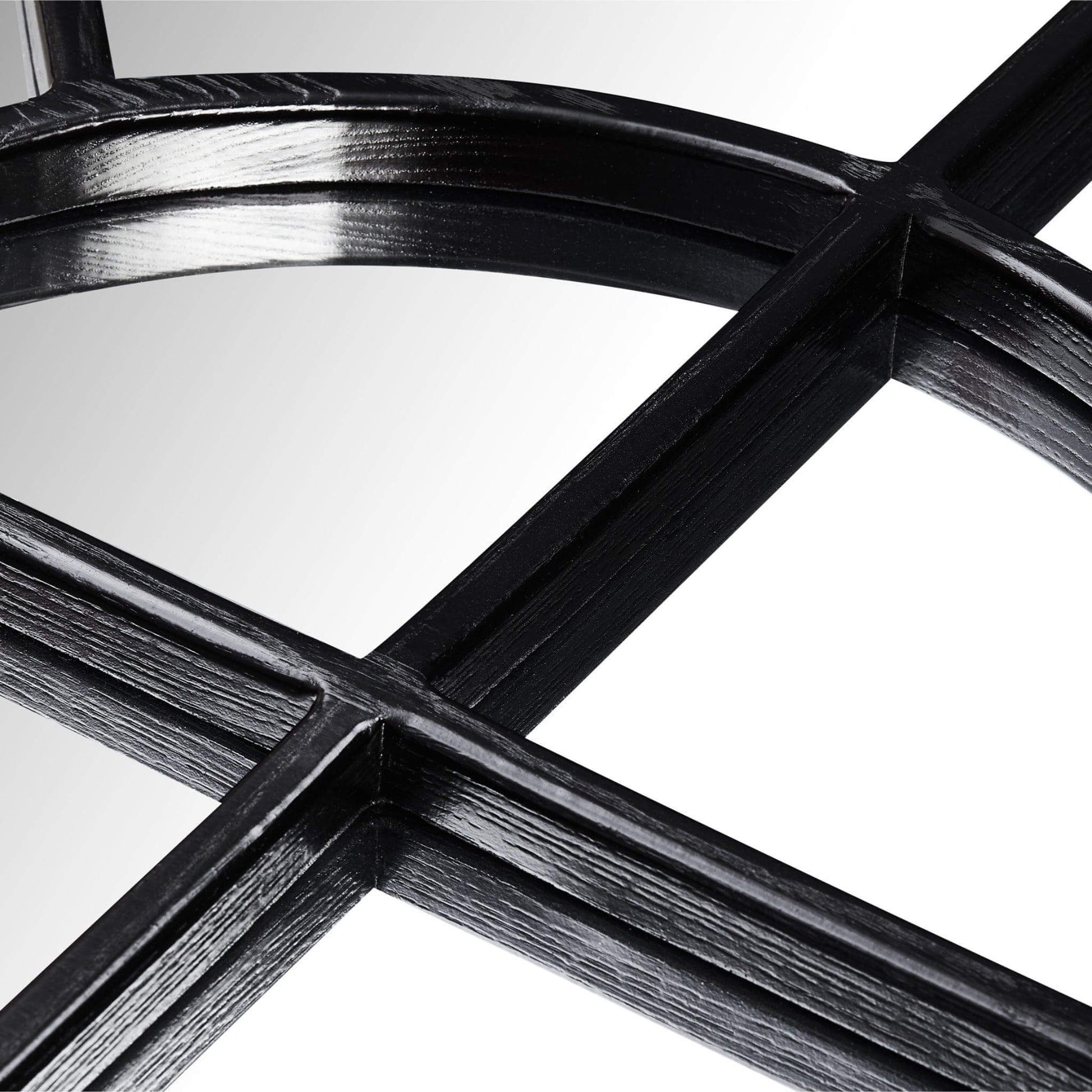 Close-up of the Arch Mirror's wood-styled resin frame featuring a distinctive arched design and windowpane layout.