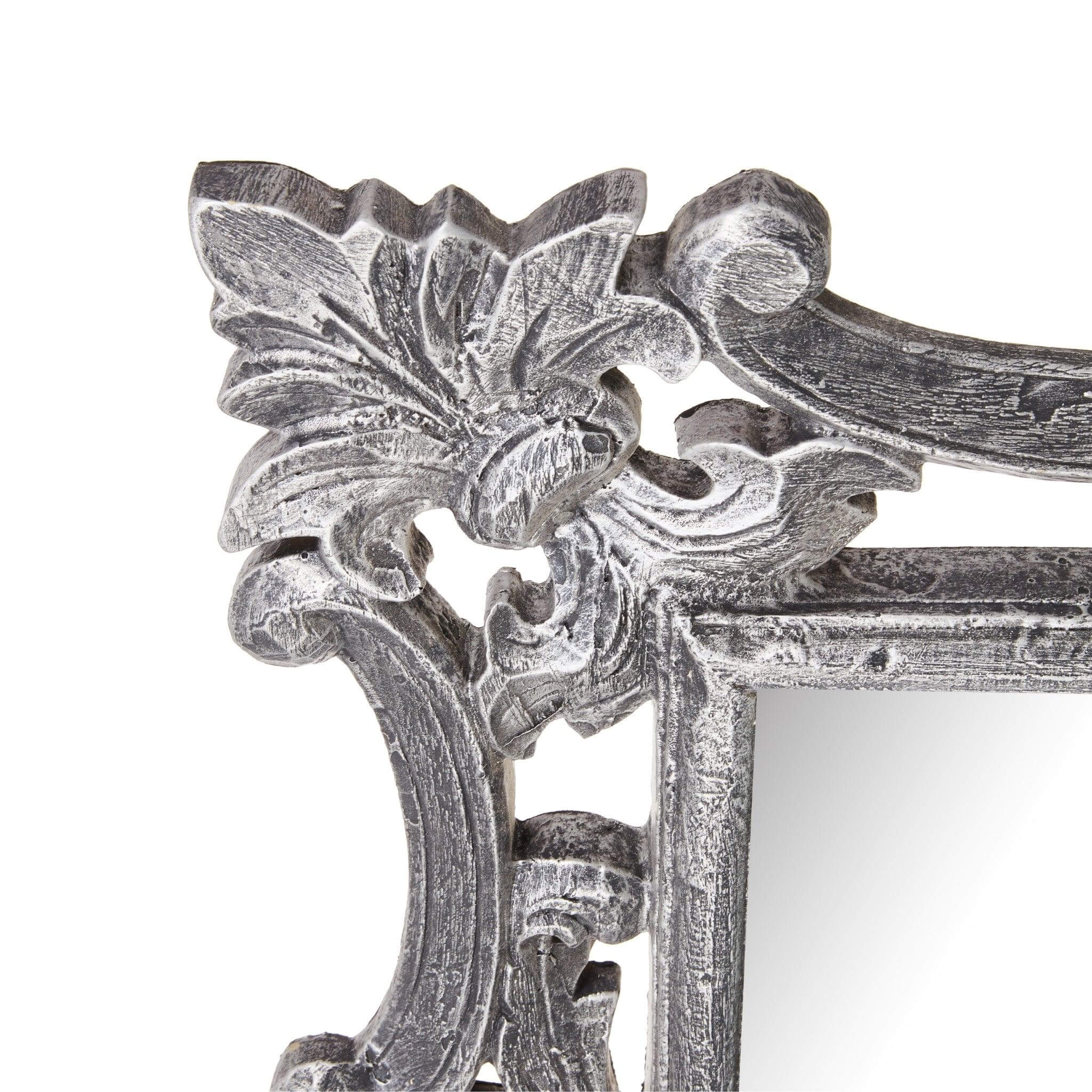 Close-up of Cove Mirror's detailed metal-styled resin frame showcasing timeless elegance and classical design.