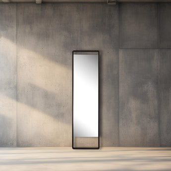 Lifestyle Image of the Eternal Mirror in Black in a warehouse setting