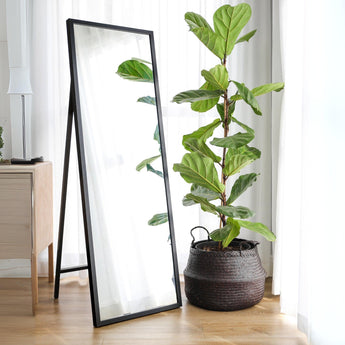 The Ileen Mirror in Black styled in a bedroom dressing corner setting