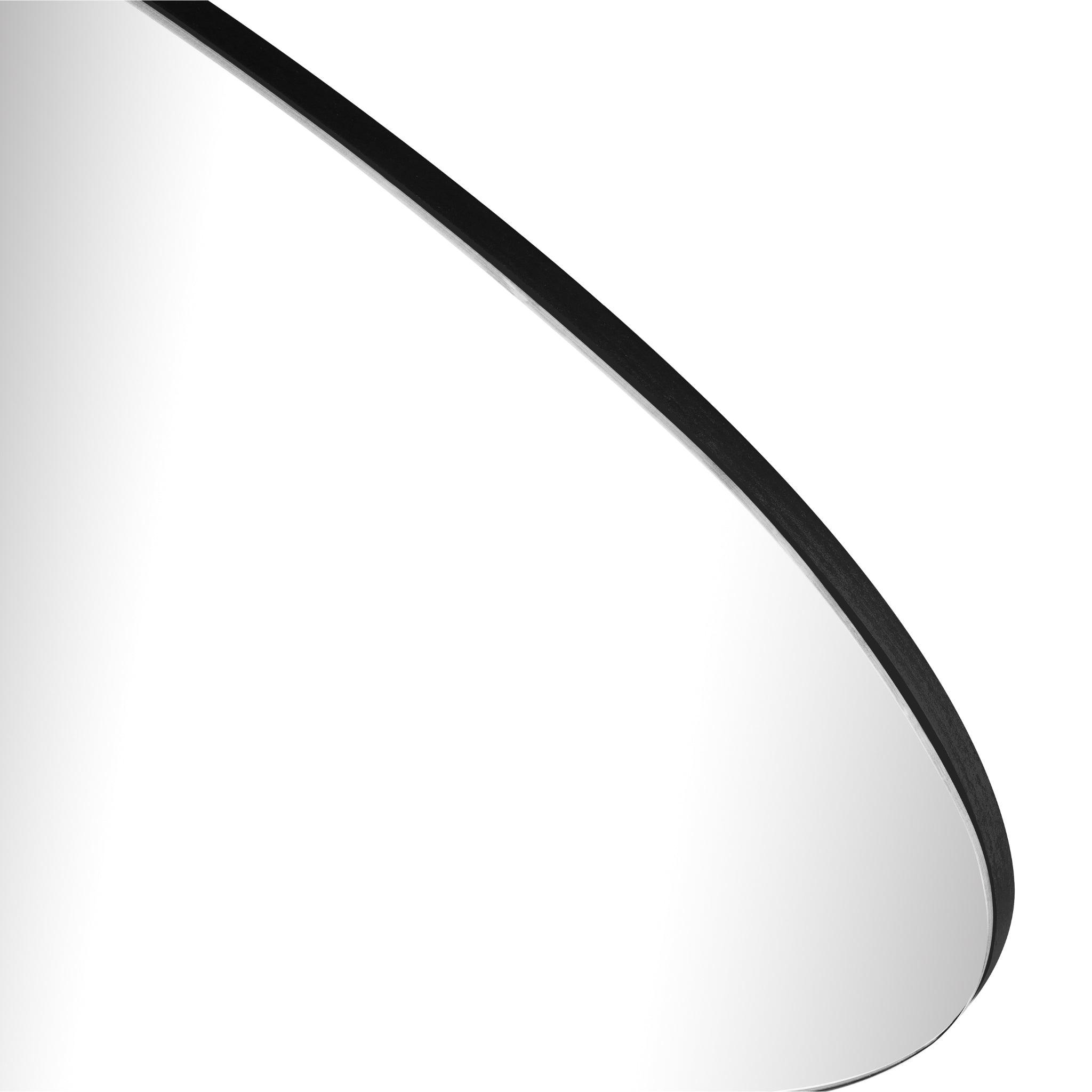 Close-up of Ira Irregular Tear Drop Mirror featuring a sleek black edge and modern teardrop design.