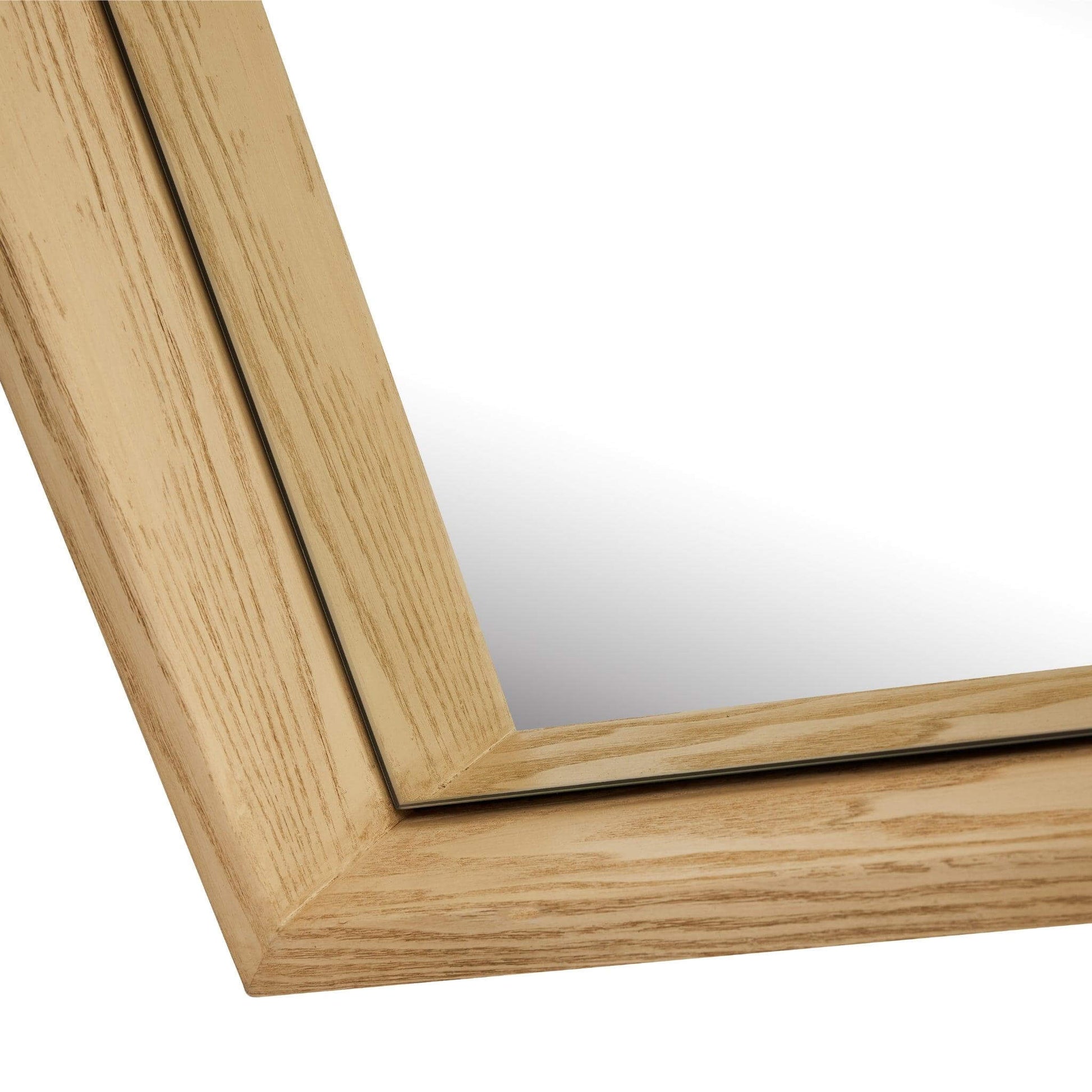 Close-up of Jupiter Mirror with wood-styled resin frame, showcasing modern elegance and minimalism.