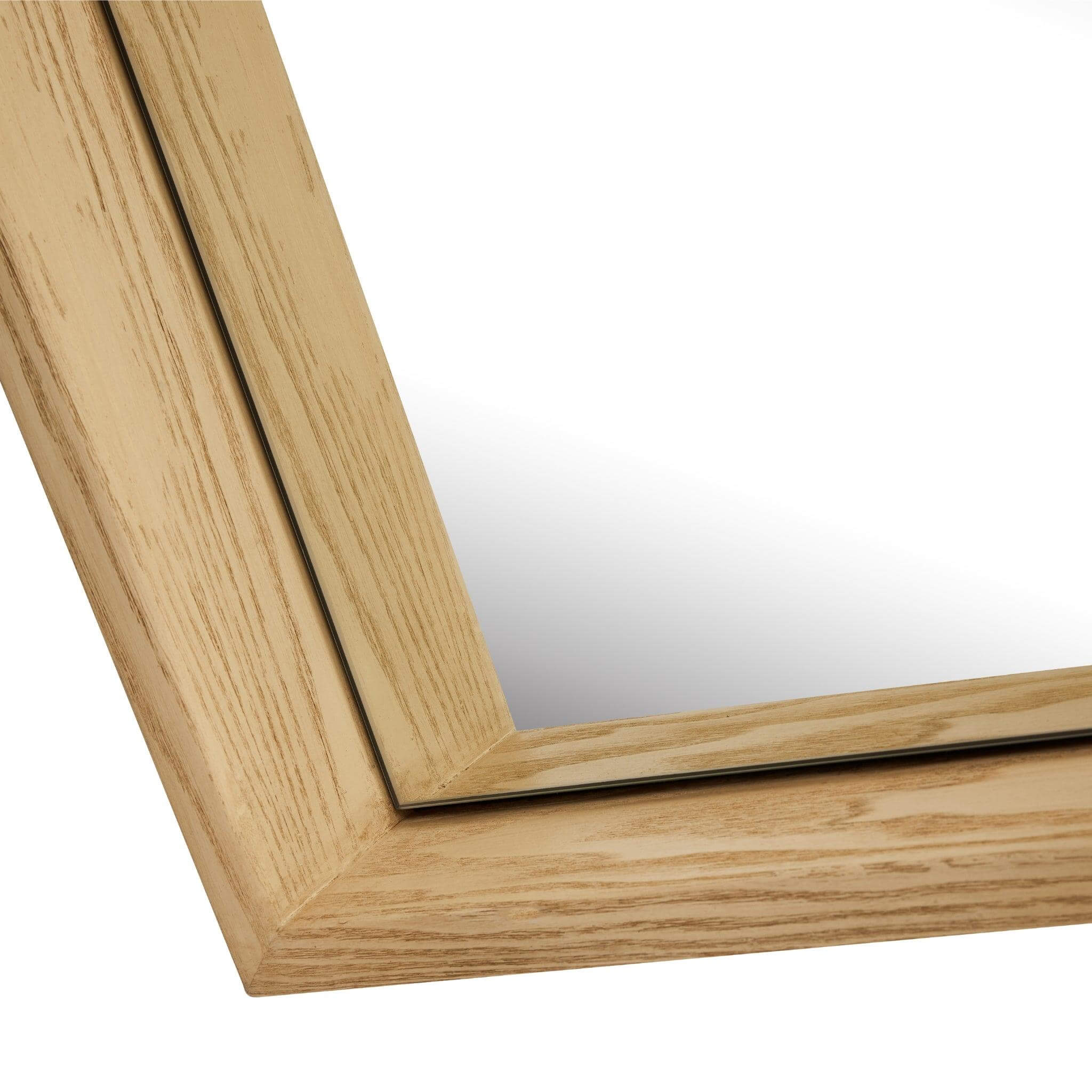 Close-up of Jupiter Mirror with wood-styled resin frame, showcasing modern elegance and minimalism.