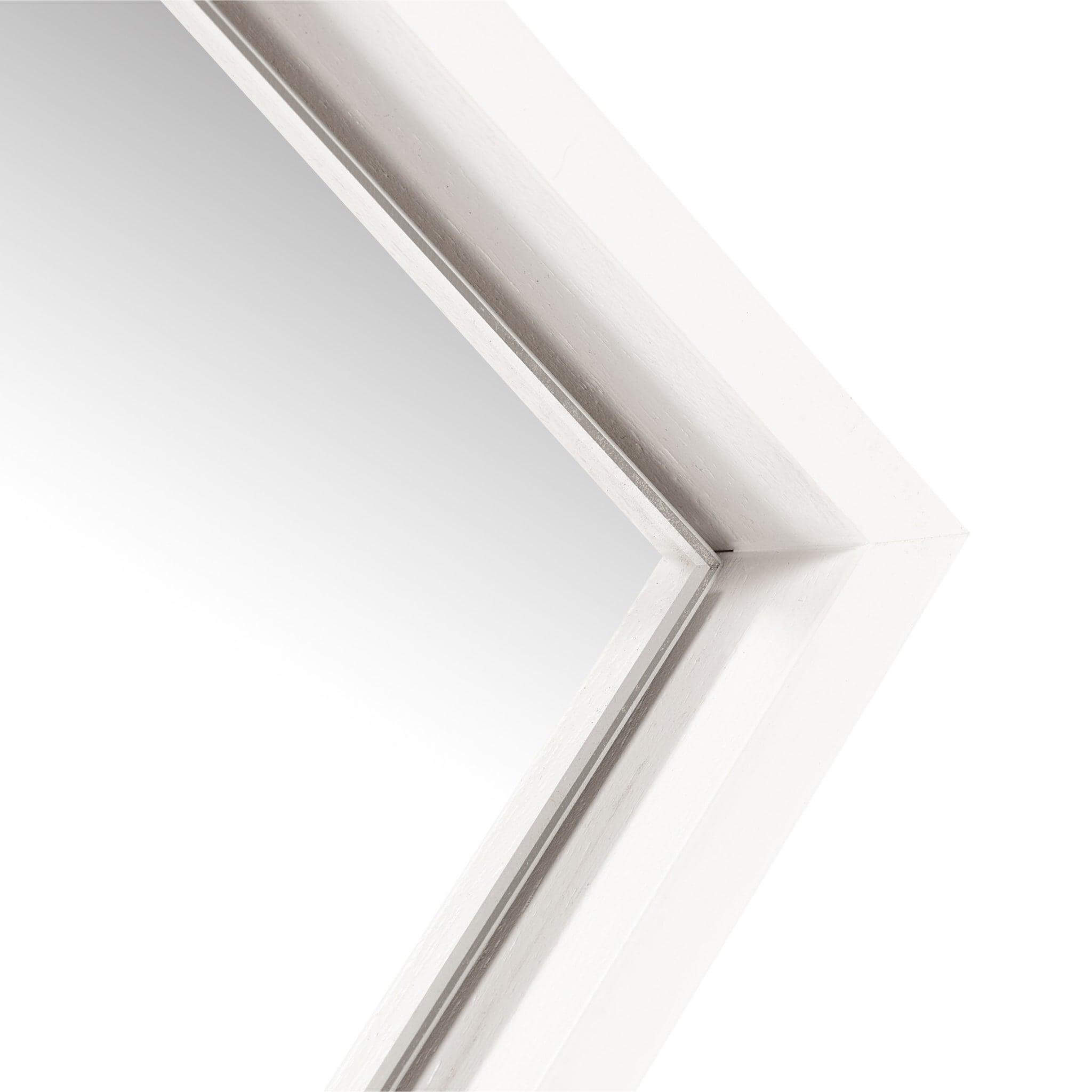 Lily Mirror Small with sleek floating wooden frame, showcasing a modern design and elegant aesthetic.