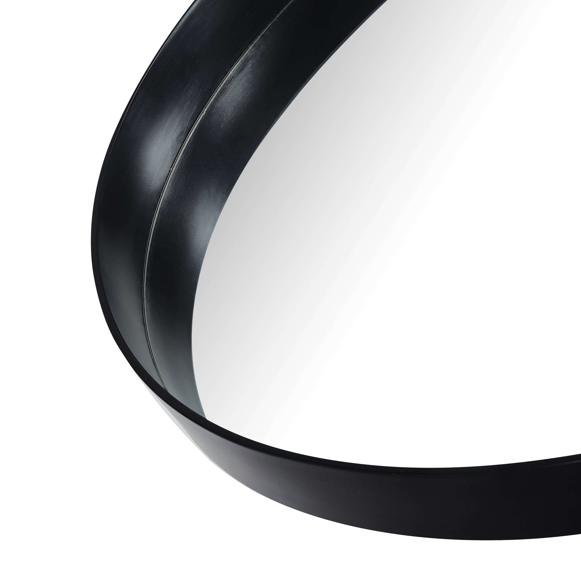 Metal round mirror close-up showing the sleek black frame and reflective surface, ideal for industrial chic decor.