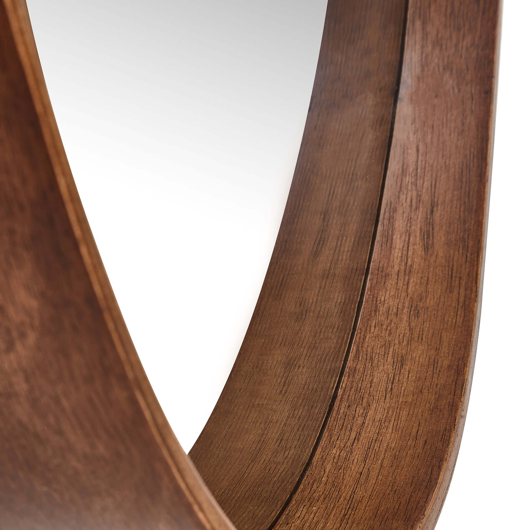 Close-up of Round Stretched Mirror showcasing tapered rubber wood frame and smooth reflective surface.