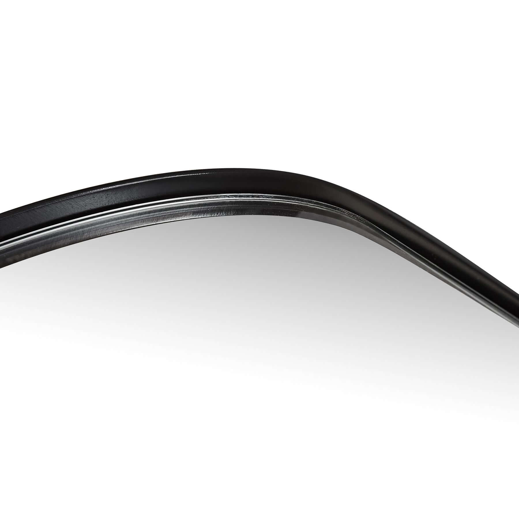 Close-up of Bravo Mirror Range with sleek black metal frame and subtly curved edge, showcasing modern design.