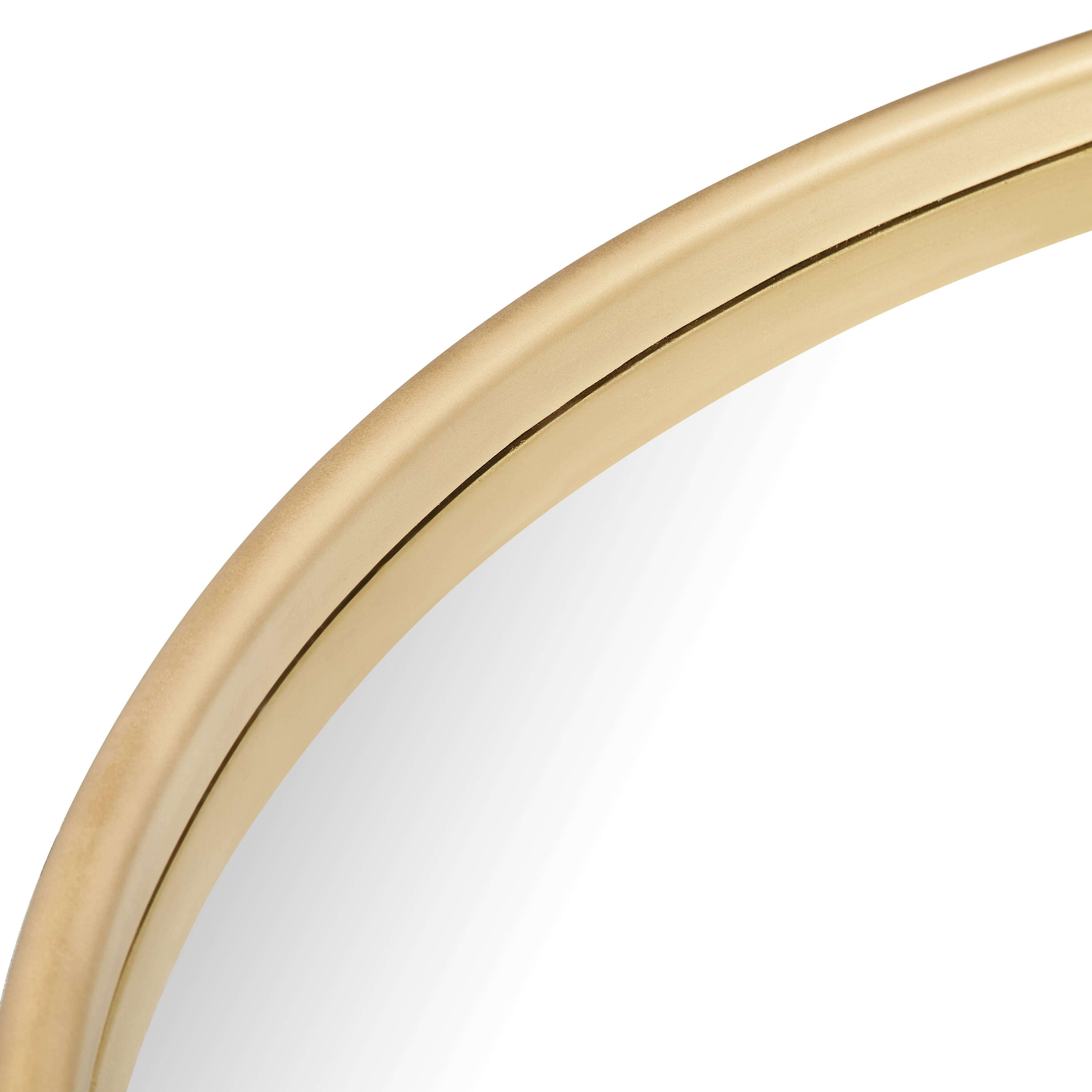 Close-up of the Maan Mirror's elegant metal frame and round design, highlighting its modern and sophisticated style.
