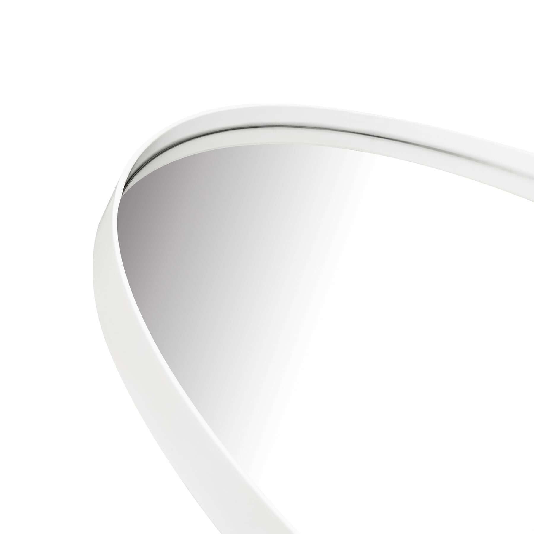 Close-up of a Metal Round Mirror with a sleek white frame showcasing its round shape and reflective surface.