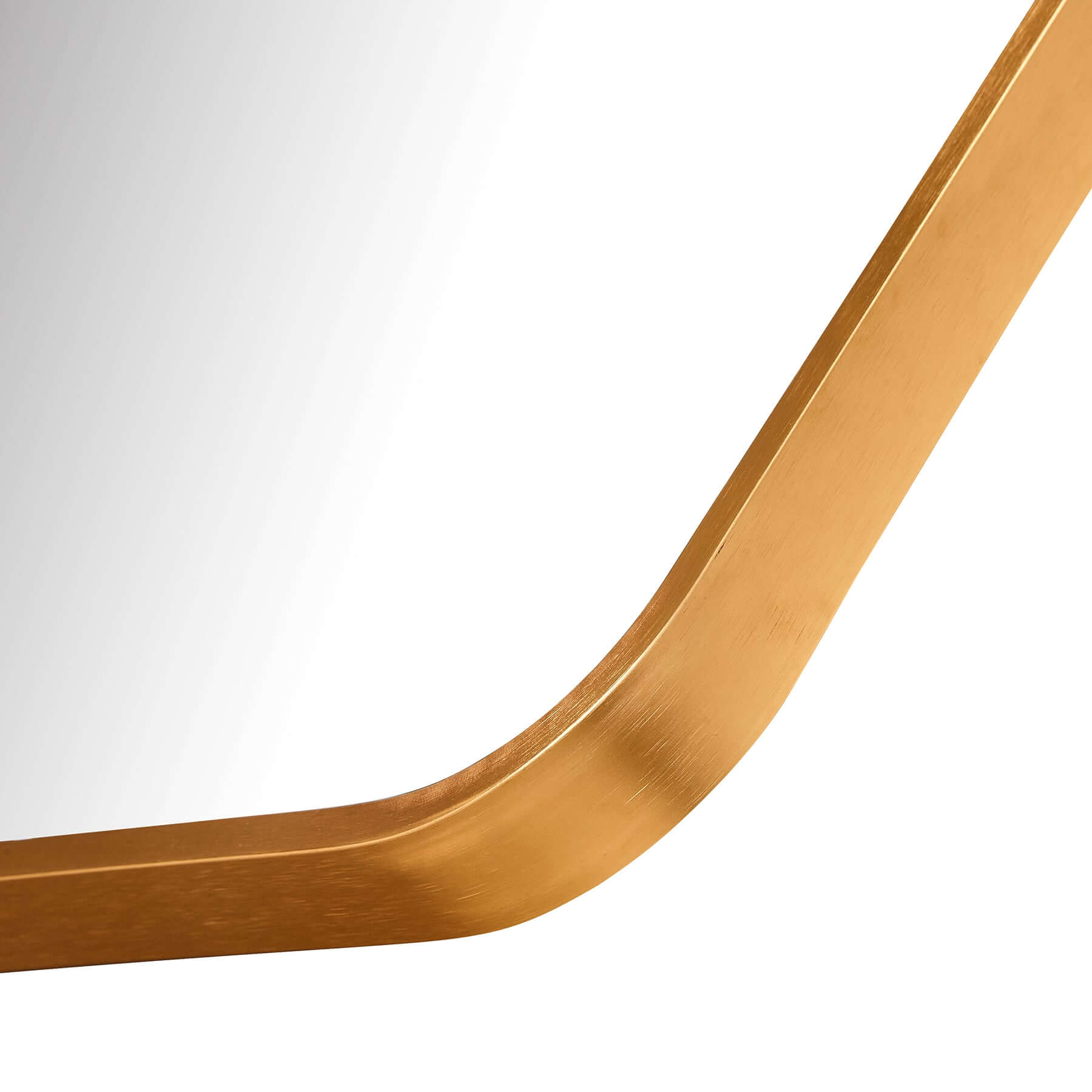 Close-up of the aluminum frame mirror's elegant gold finish and rounded edges for a contemporary touch.