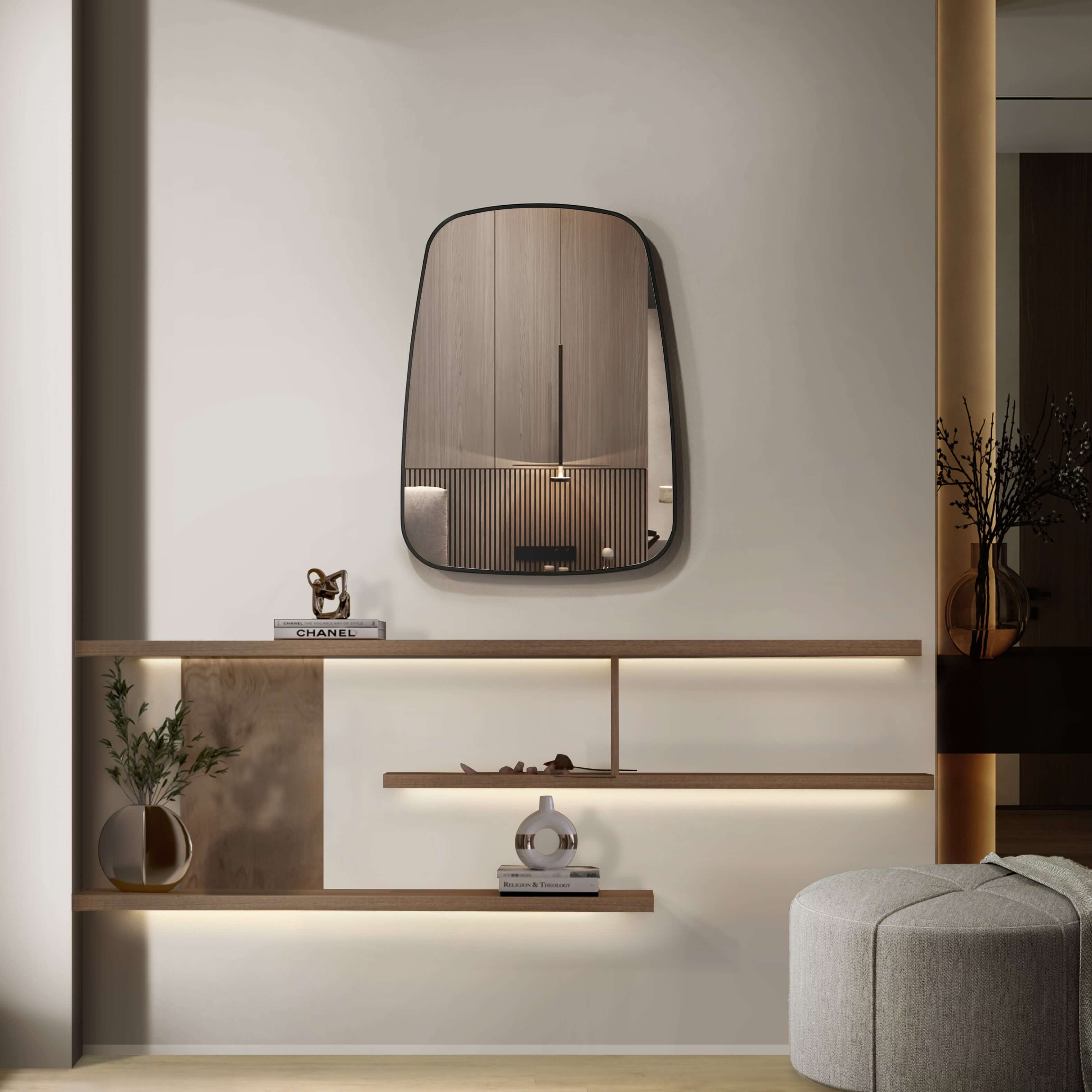 Modern aluminum framed mirror with soft edges hanging above a stylish wooden shelf in a contemporary interior.