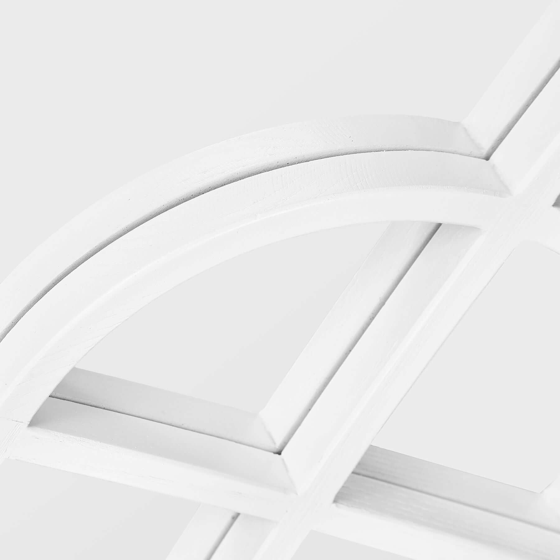 Close-up of Arch Mirror detailing showcasing the arched wood-styled resin frame design.