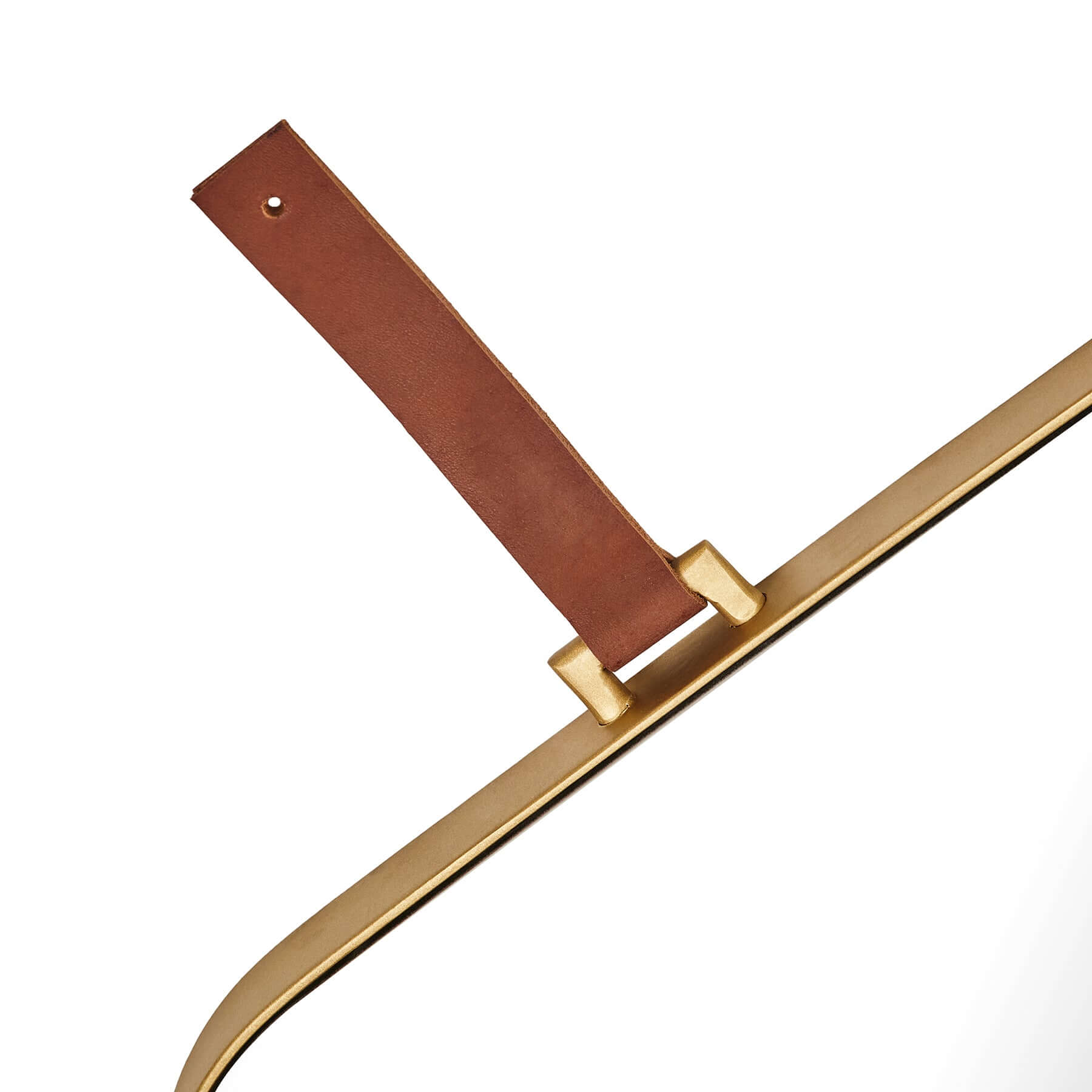 Detail of Lexi Square Mirror with leather strap and gold accent, showcasing modern elegance and design.