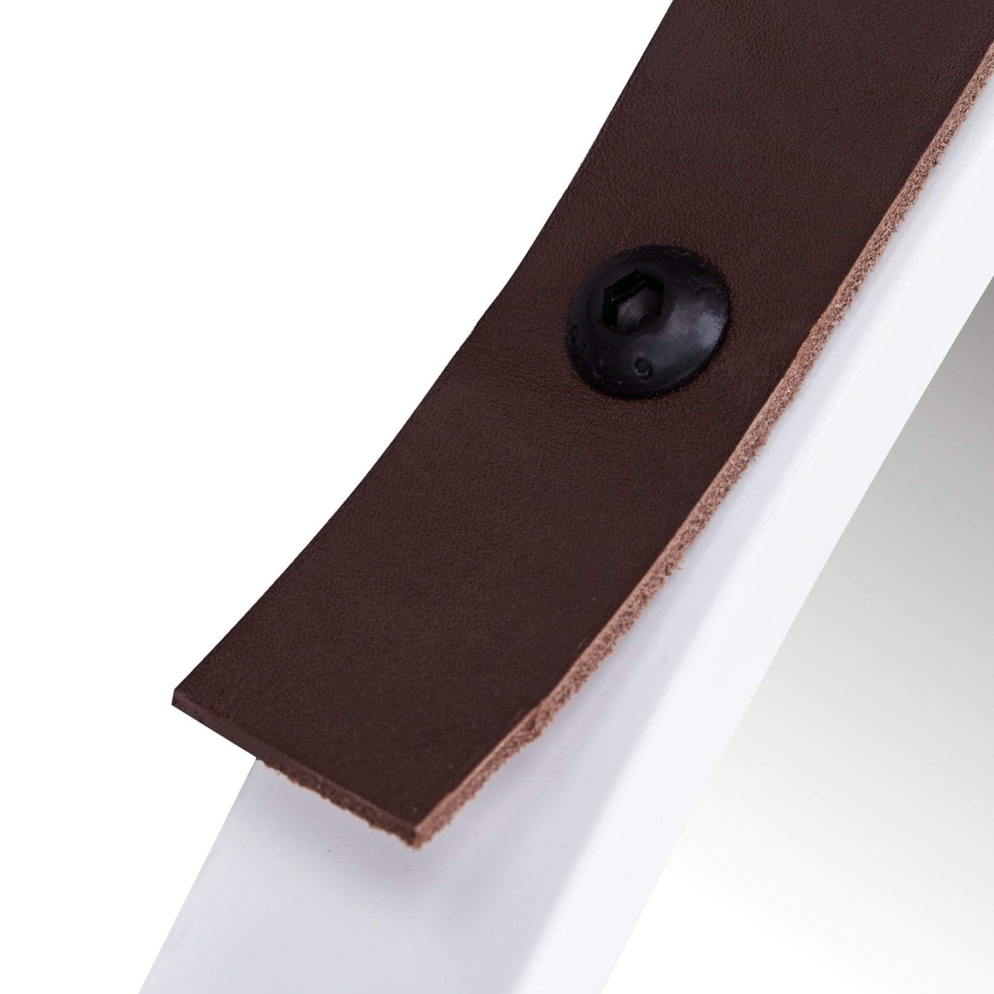 Close-up of the Stellar Mirror's leather strap and sleek resin frame, showcasing modern elegance.