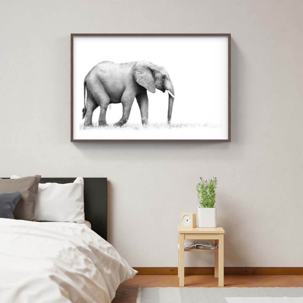 Framed elephant print in a modern bedroom, showcasing premium African wildlife artwork.