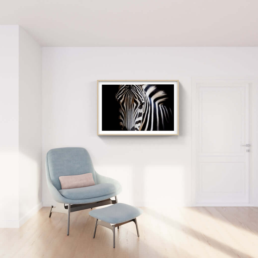 Framed wildlife print of a zebra, enhancing modern interior decor with African cultural art.