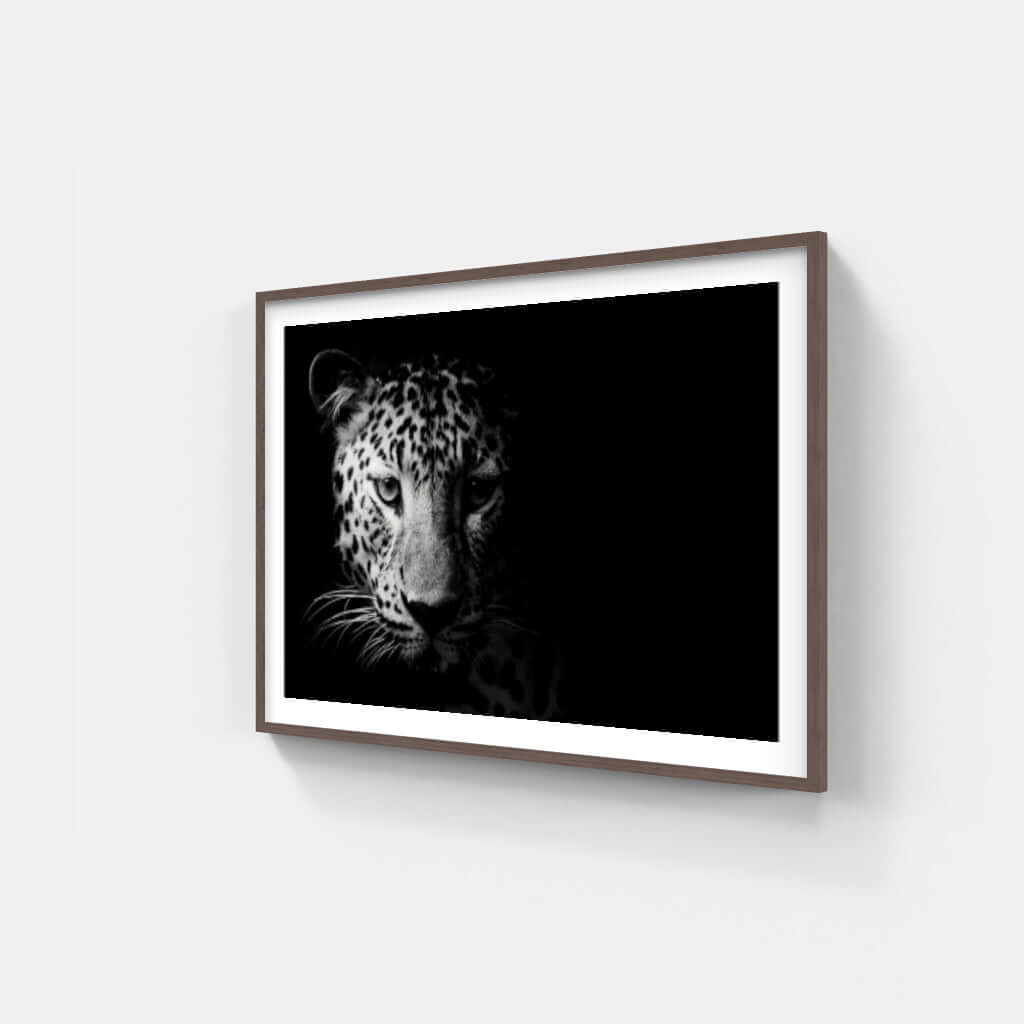 Framed black and white leopard artwork, showcasing wildlife beauty for modern or traditional decor.