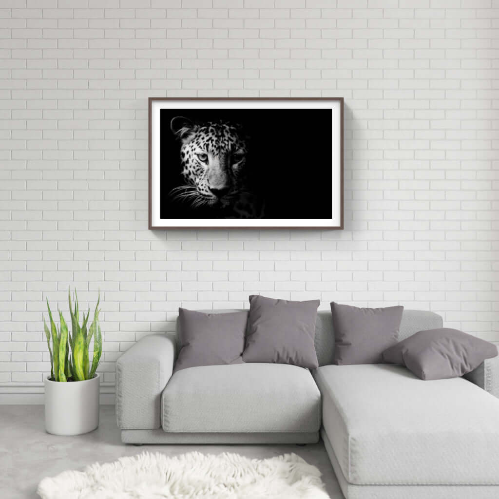 Framed leopard face artwork in a modern living room, perfect for adding elegance to any space.