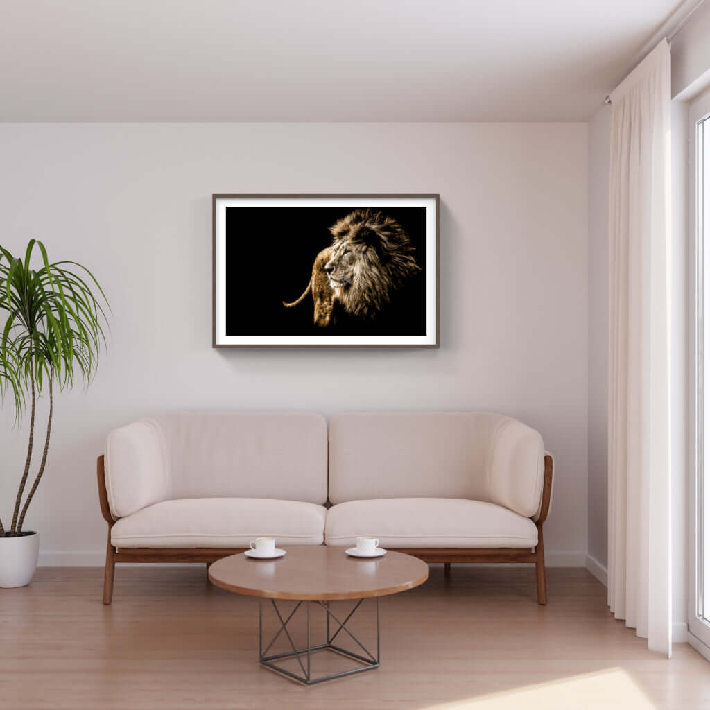 Framed wildlife print of a majestic lion in a modern living room setting, showcasing African cultural artwork.