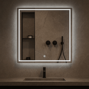 Frameless LED mirror with smart touch sensor control, illuminated elegance for modern bathrooms.