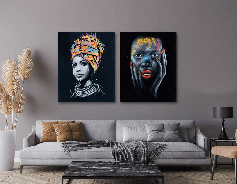 Stylish living room featuring two vibrant canvases of portraits with bold colors and intricate details.